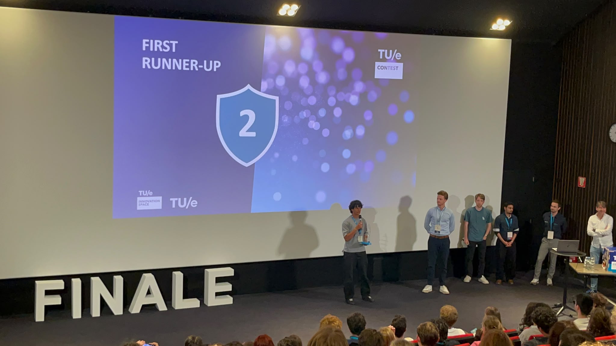 Lucas receiving the TU/e Contest First Runner-Up award